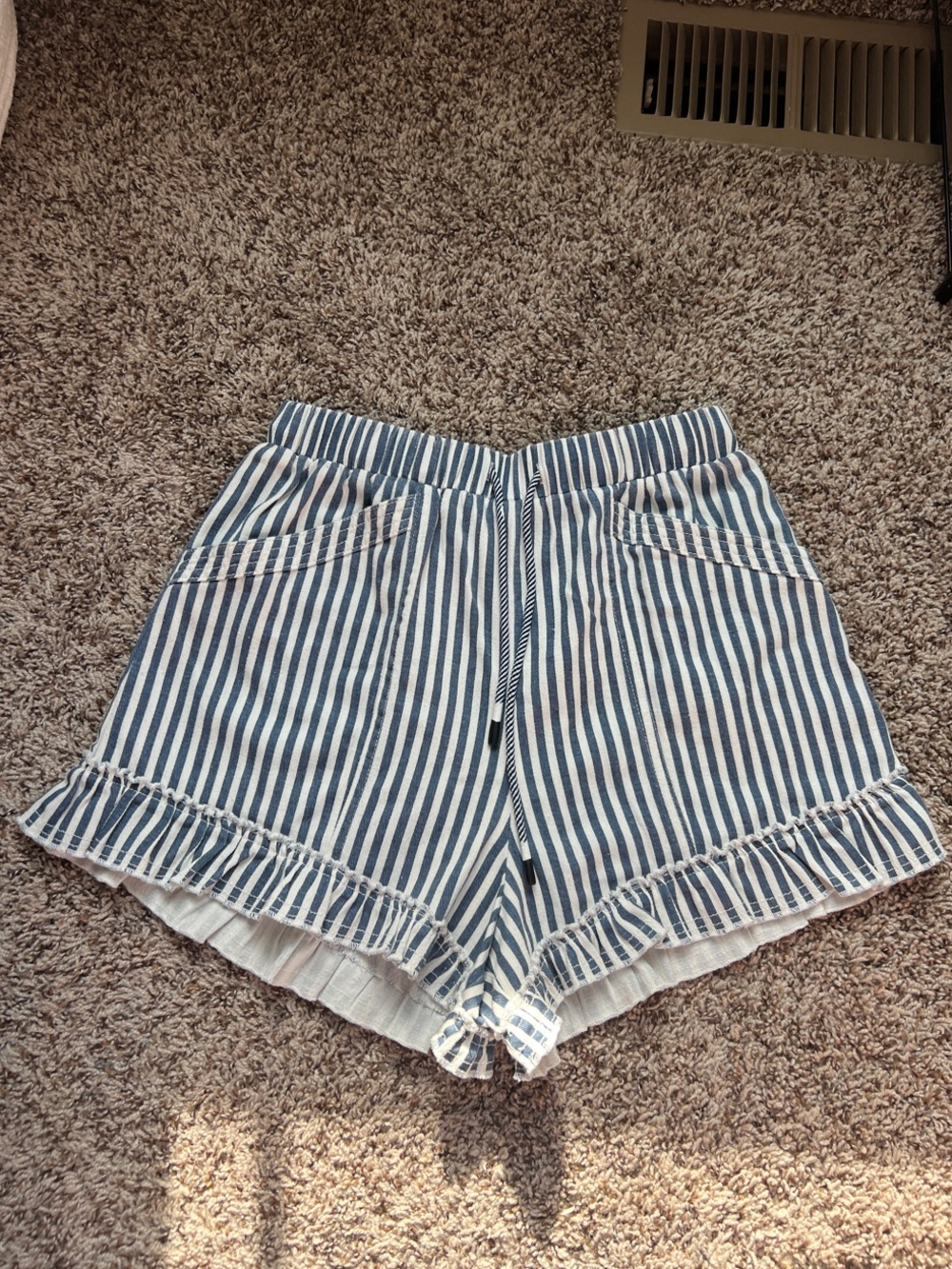 High-Waist Blue and White Striped Ruffle Hem Shorts. New with tags
